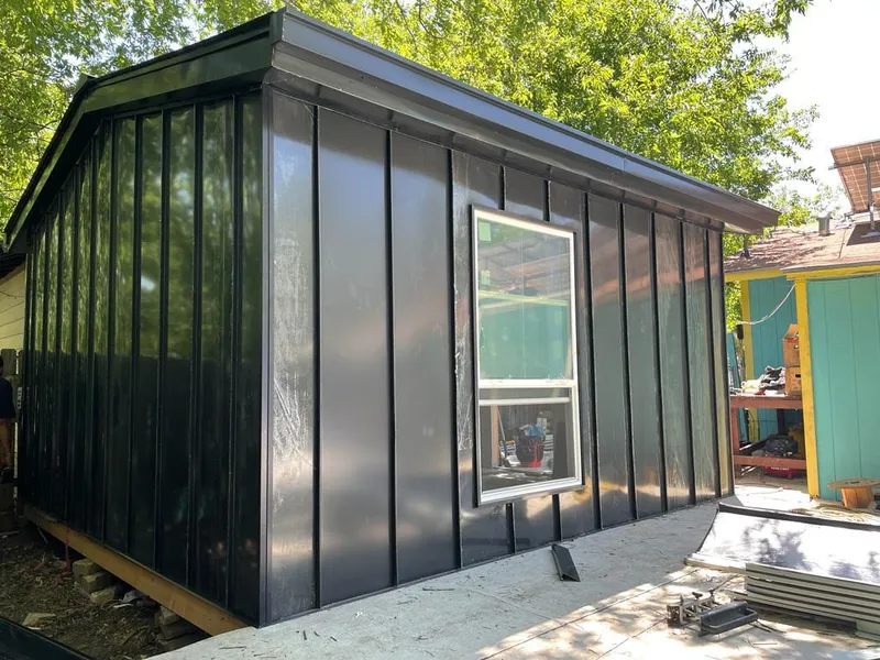 Black standing seam metal wall panels for Roof Inspection in Boonton